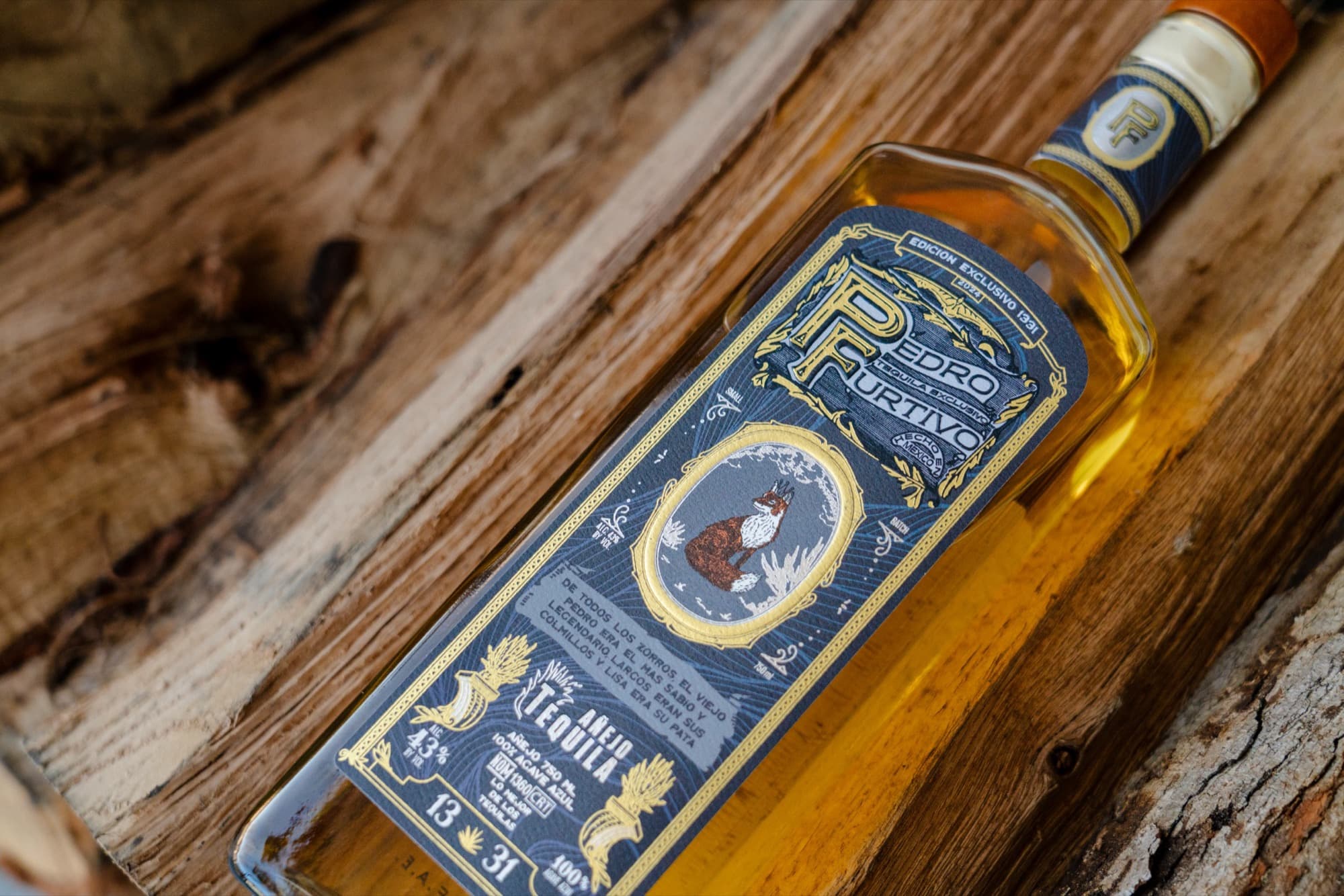 Close-up of the 1331 Añejo’s navy and gold engraved label