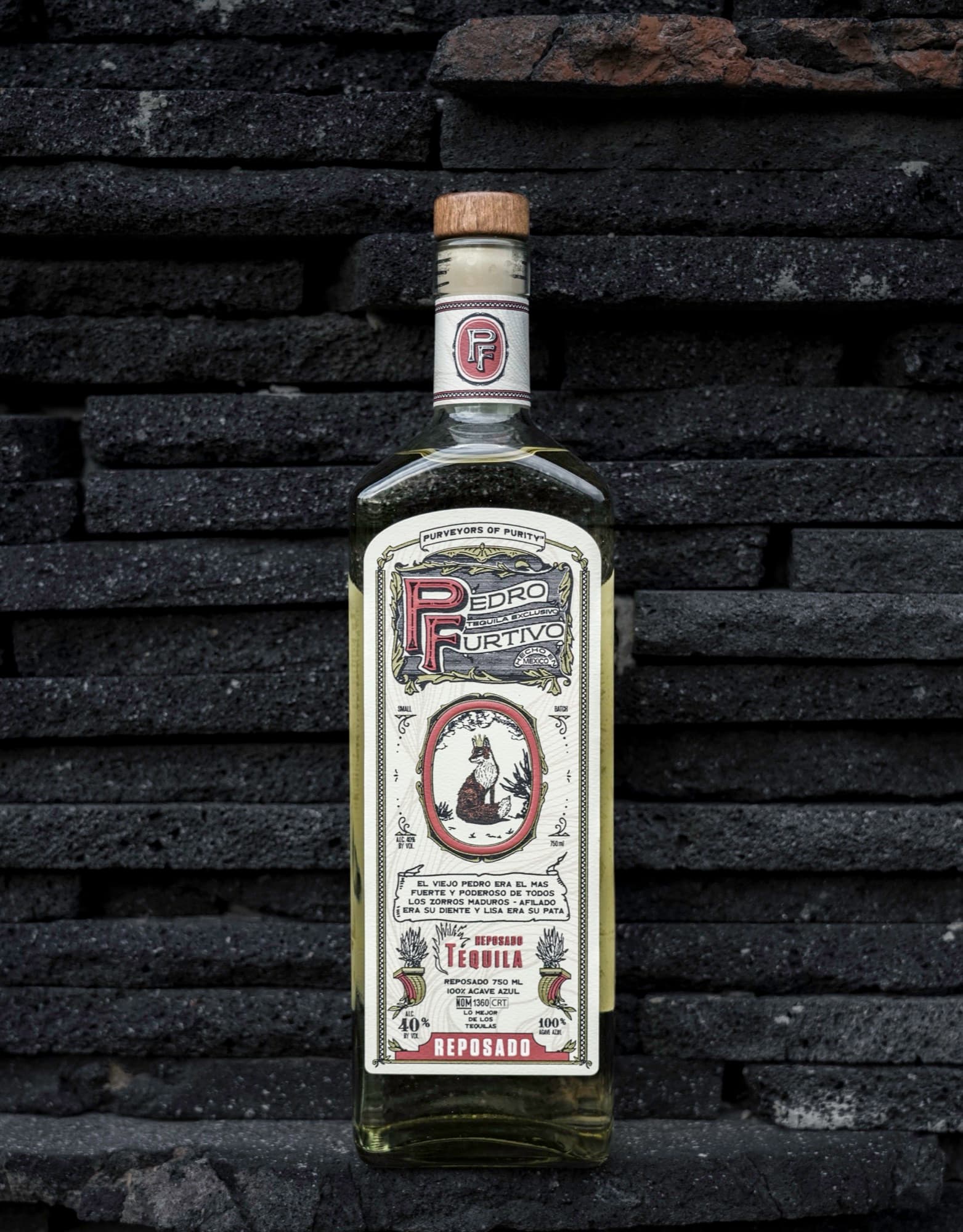 Pedro Furtivo Reposado against a dark stacked-stone wall