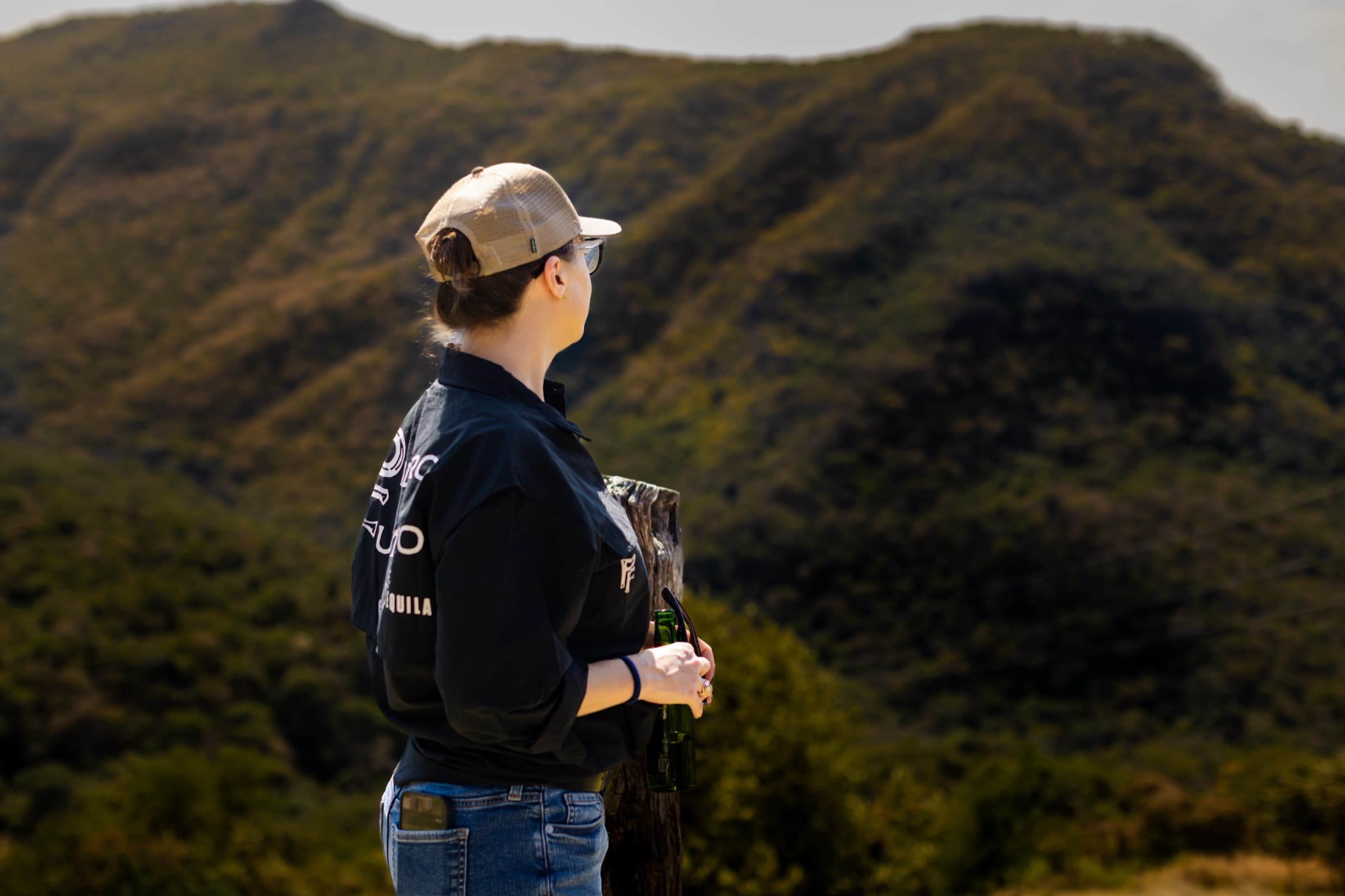 A member of the Pedro Furtivo team in a PF jacket looking out over the mountains
