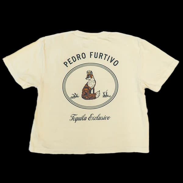 Back of a cream cropped T-shirt with Pedro Furtivo above a crowned fox in an oval frame and Tequila Exclusivo in script