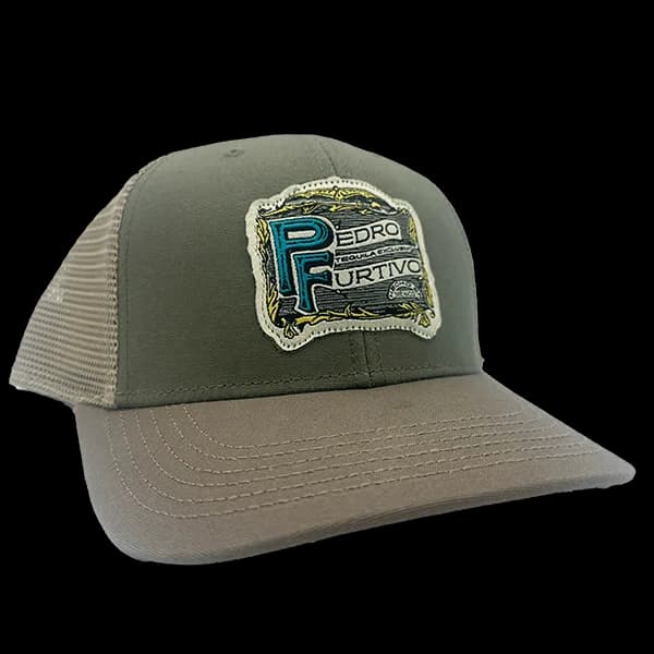 Olive trucker hat with khaki mesh and a woven Pedro Furtivo label patch